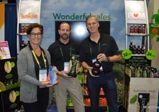 Erika Descoust, Brian Gadwah and Kurt Vetter with the Wonderful Company show the company’s main products: Halo mandarins, pistachios and POM’s pomegranate juice.